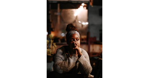 a lady who is sitting to Reflect and Meditate